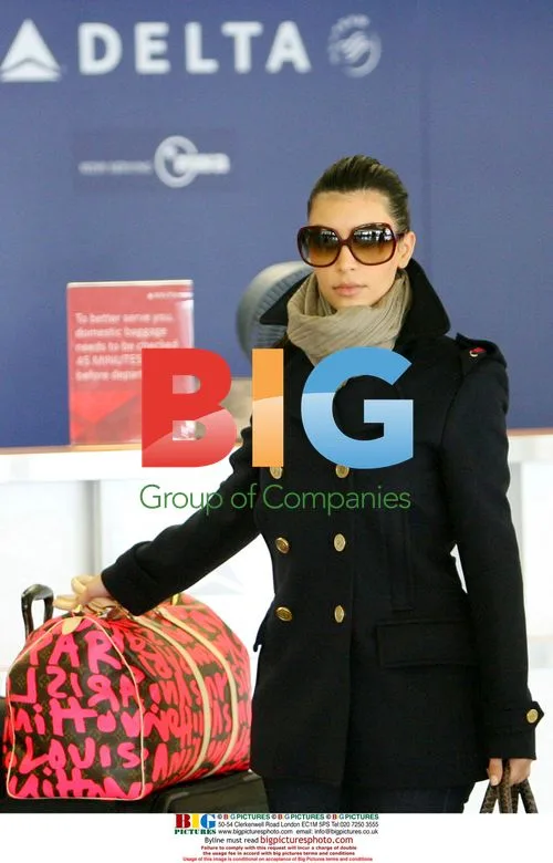 Kim Kardashian and Reggie Bush at LAX