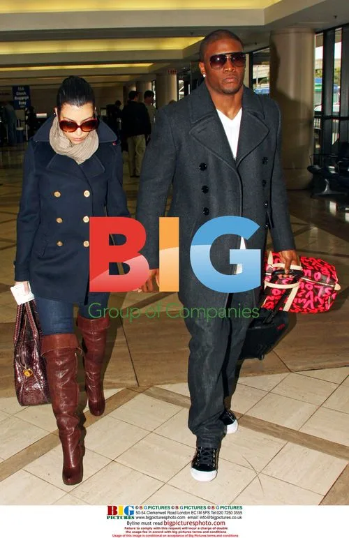 Kim Kardashian and Reggie Bush Travel at LAX