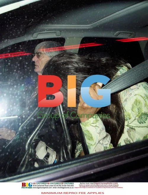F1 Boss Bernie Ecclestone with Mystery Woman