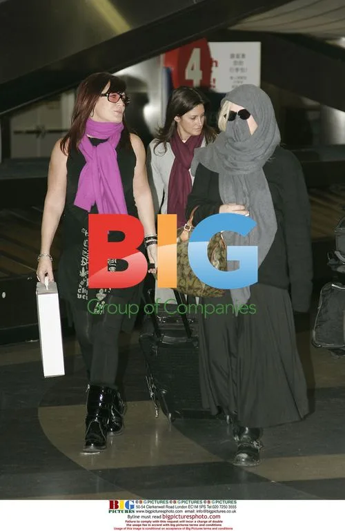 Patricia Arquette at LAX with friends