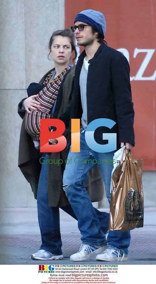 Gael Garcia Bernal and girlfriend with newborn in Madrid