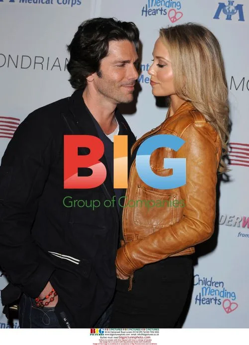 Elizabeth Berkley and Greg Lauren at Children Mending Hearts Benefit