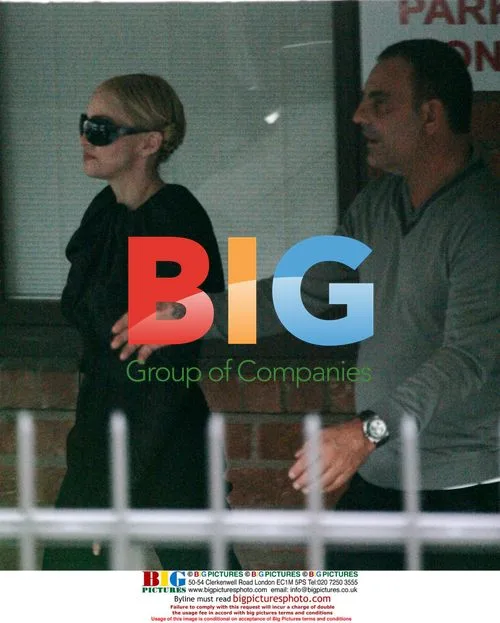 Madonna visits Audigier's office