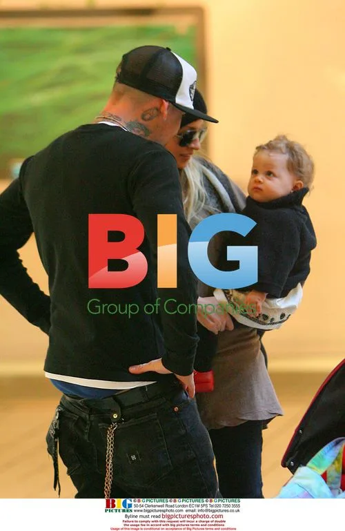 Nicole Richie and Joel Madden shopping with daughter