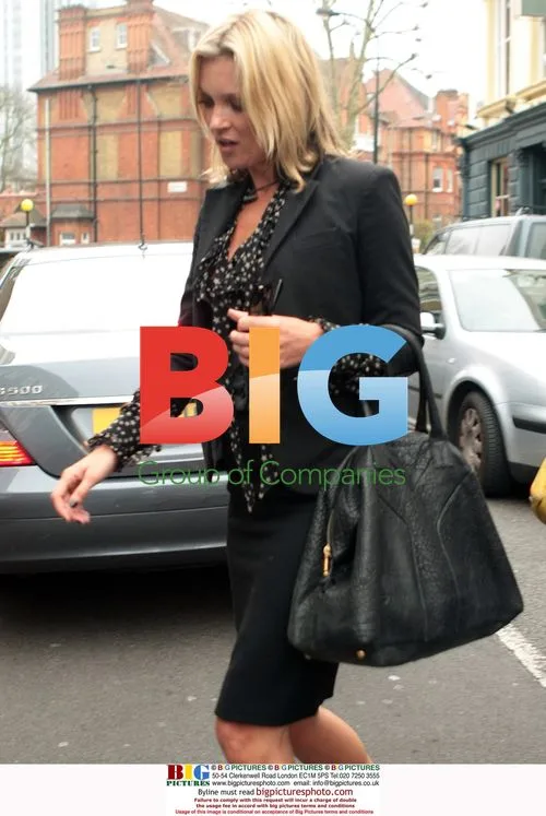 Kate Moss visits college and pub in London