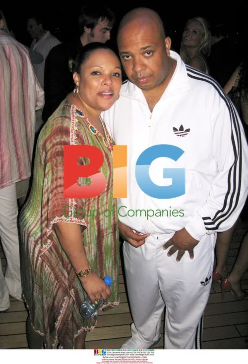 Eddie Murphy with girlfriend at Paul Allen's party
