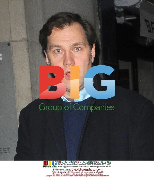 David Morrissey and Kira Sternbach walk in Soho