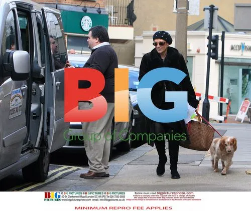 Anne Robinson out shopping with dog
