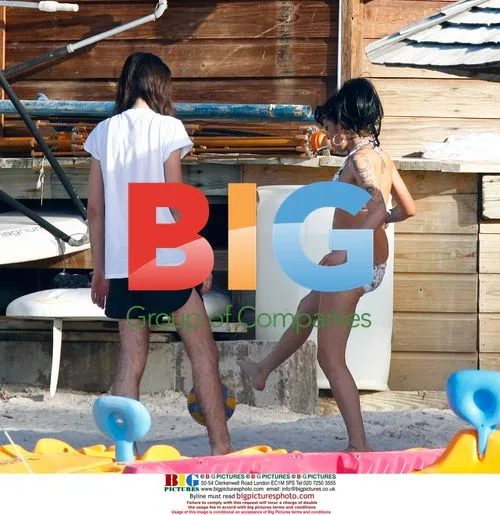 Amy Winehouse and Blake Wood on Caribbean beach