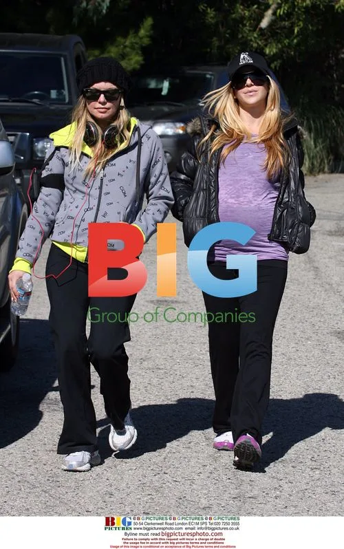 Fergie and pregnant friend take stroll