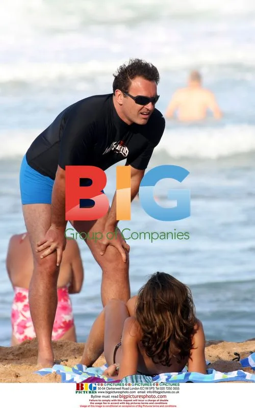 Julian McMahon and Kelly Paniagua at the beach