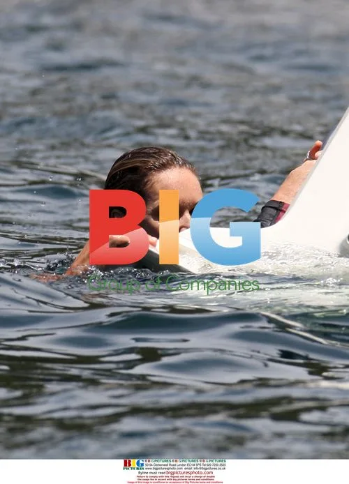 Elle Macpherson water skis in Australia
