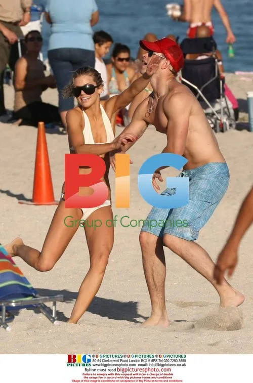AnnaLynne McCord and Kellen Lutz frolic on Miami beach