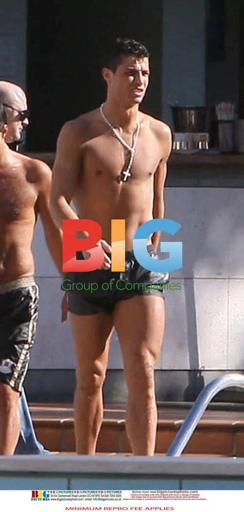 Ronaldo relaxes by the pool