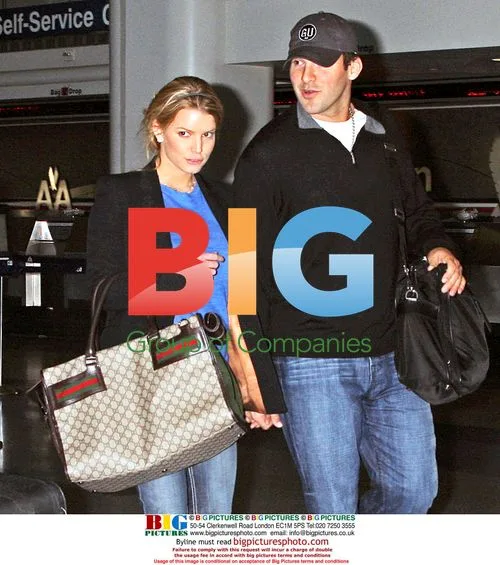 Jessica Simpson and Tony Romo Arrive at LAX