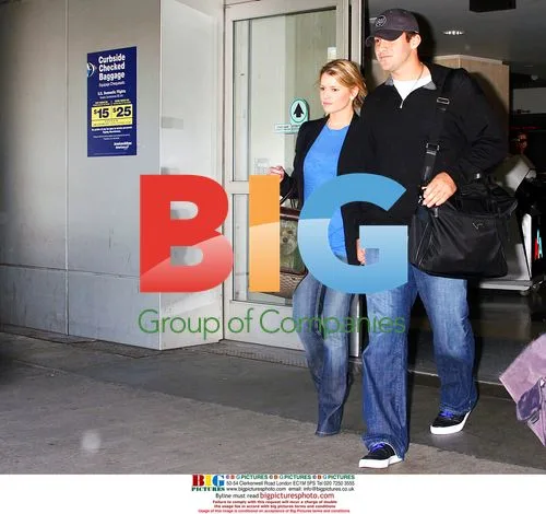 Jessica Simpson and Tony Romo at LAX