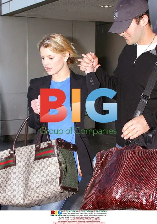 Jessica Simpson and Tony Romo at LAX
