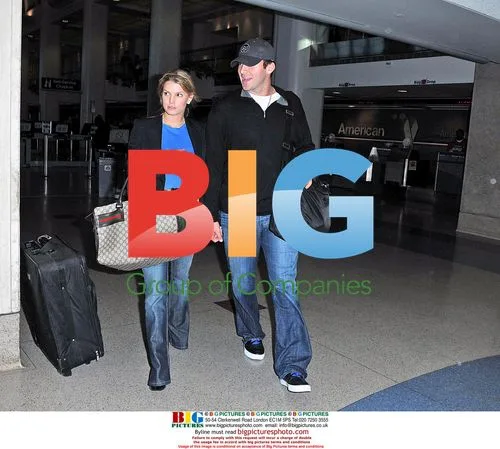 Jessica Simpson and Tony Romo Arrive at LAX