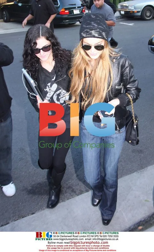 Lindsay Lohan arrives home with Alli Sims
