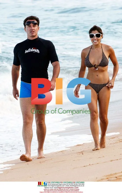 Julian McMahon with girlfriend and kids at beach