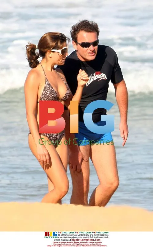 Julian McMahon and GF Kelly Paniagua at Beach