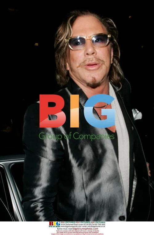 Mickey Rourke and date at Mr Chow in Beverly Hills
