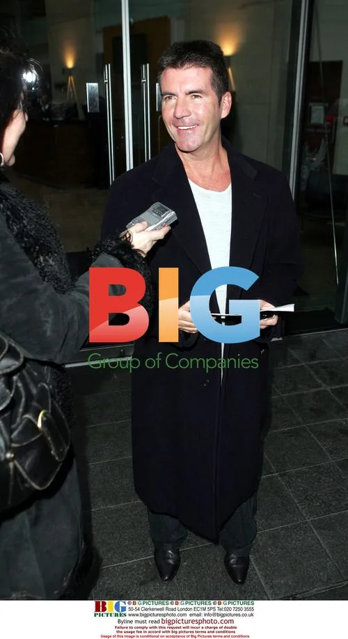 Simon Cowell leaves hotel for BGT filming