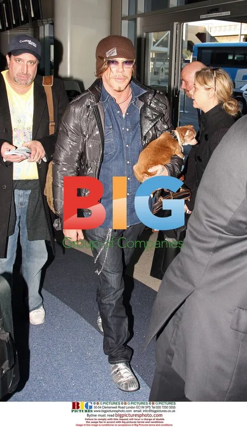 Mickey Rourke at LAX with dog