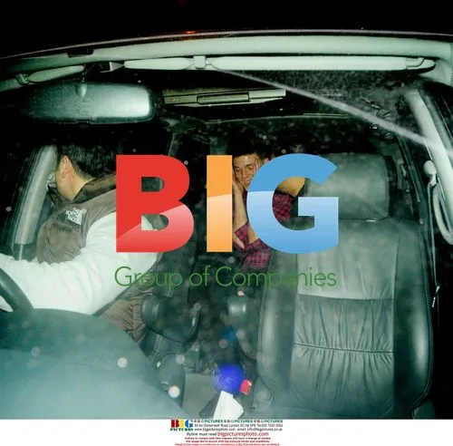 Prince Azim leaving Boujis Nightclub with young man