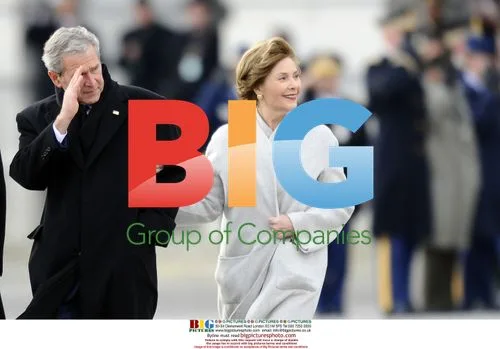 George W. Bush salutes after Obama inauguration