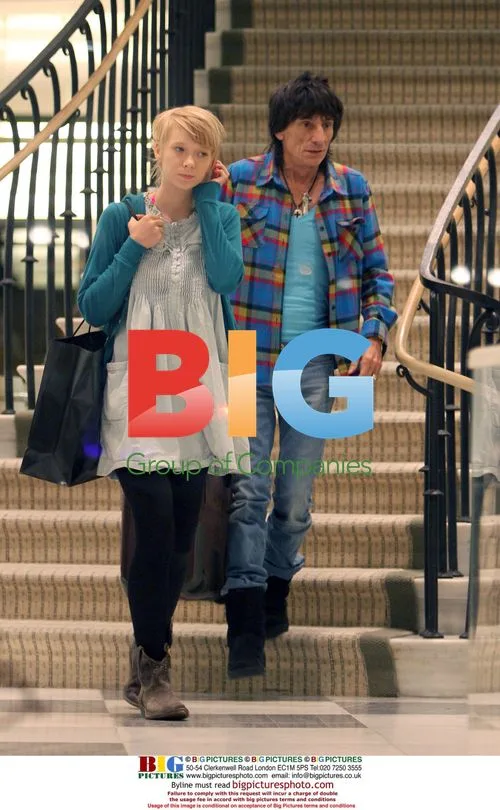 Ronnie Woods with girlfriend shopping