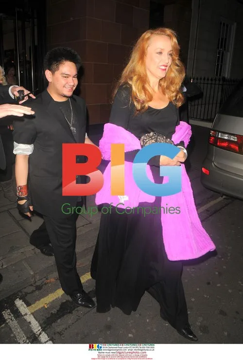 Prince Azim and Jerry Hall leaving Cipriani's