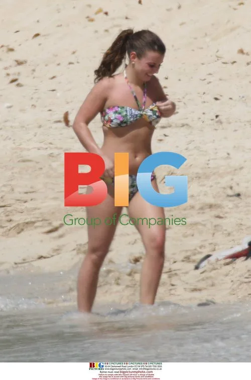 Coleen Rooney Enjoys Caribbean Vacation