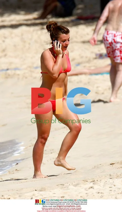 Coleen Rooney on Caribbean beach