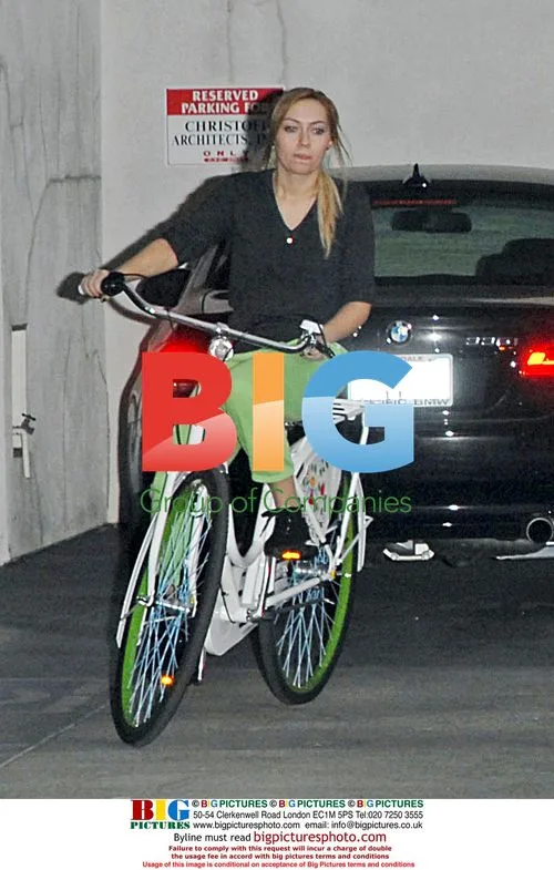 Miley Cyrus Bikes with Family