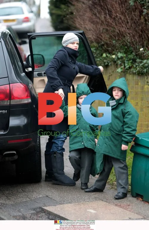 Jade Goody leaving home for school run