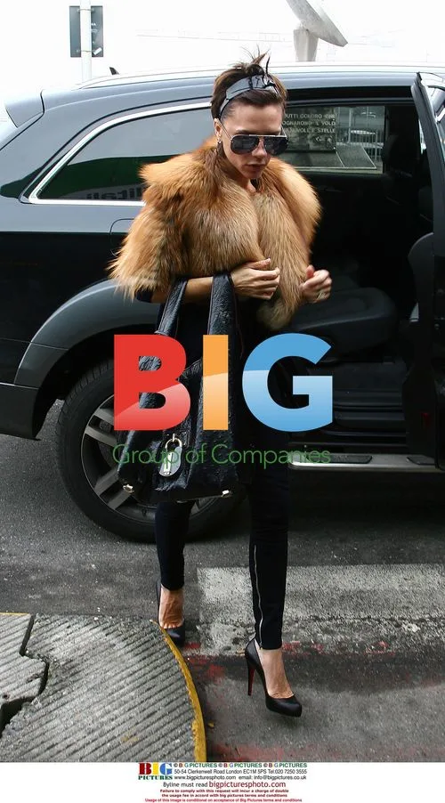 Victoria Beckham Arrives at Milan Airport