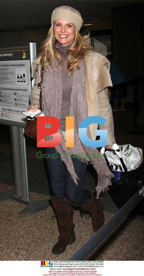 Christie Brinkley Passing Through Airport