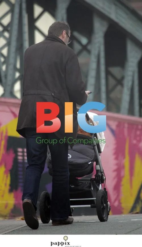 Andrew Morton and Baby Out in London