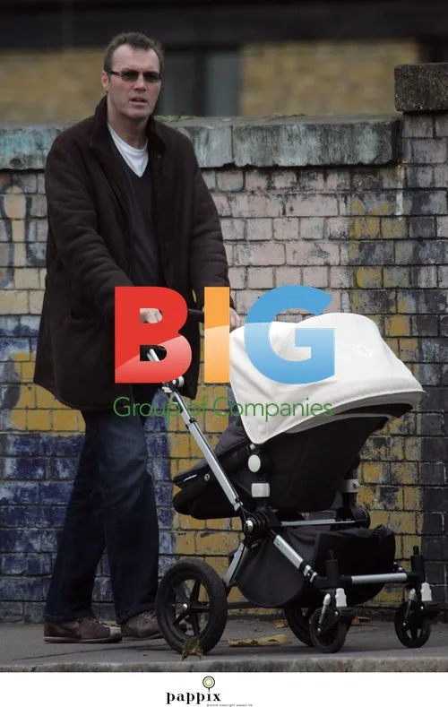 Princess Diana biographer with baby in London