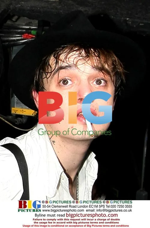 Pete Doherty with new friend at gig