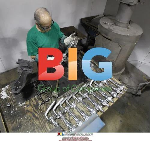 Luis Villalobos inspects Oscar statuette