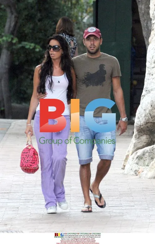 Andrew Dossena relaxes with woman in Capri