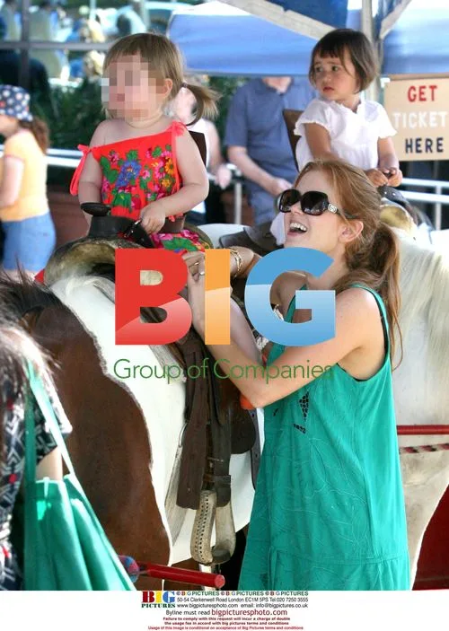 Isla Fisher and daughter at farmers market