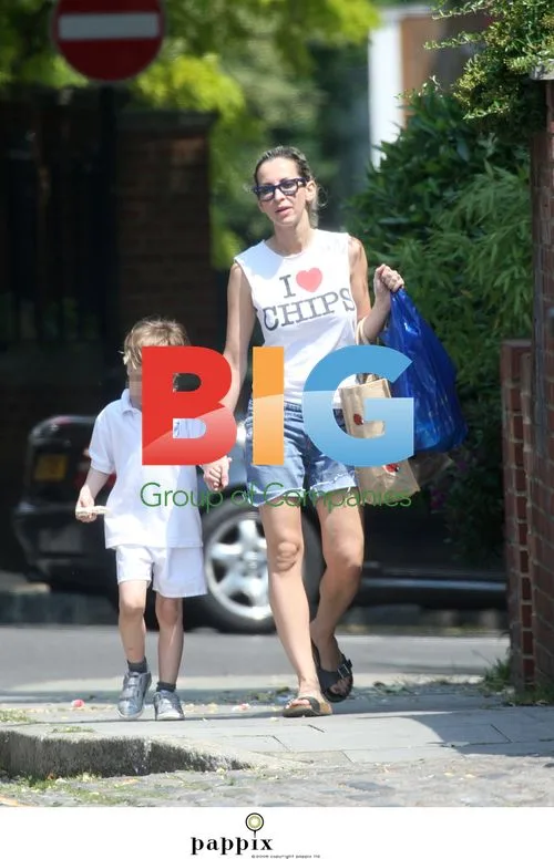 Natalie Appleton out with son Ace