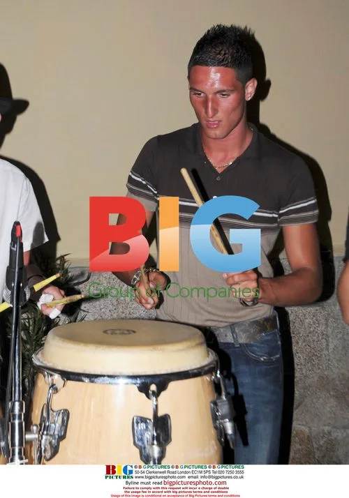 Macheda Plays Drums at Italian Restaurant