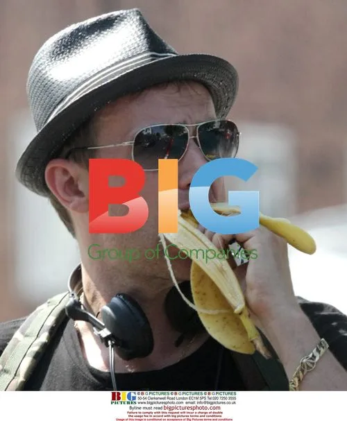 Damon Albarn munching on a banana in Notting Hill