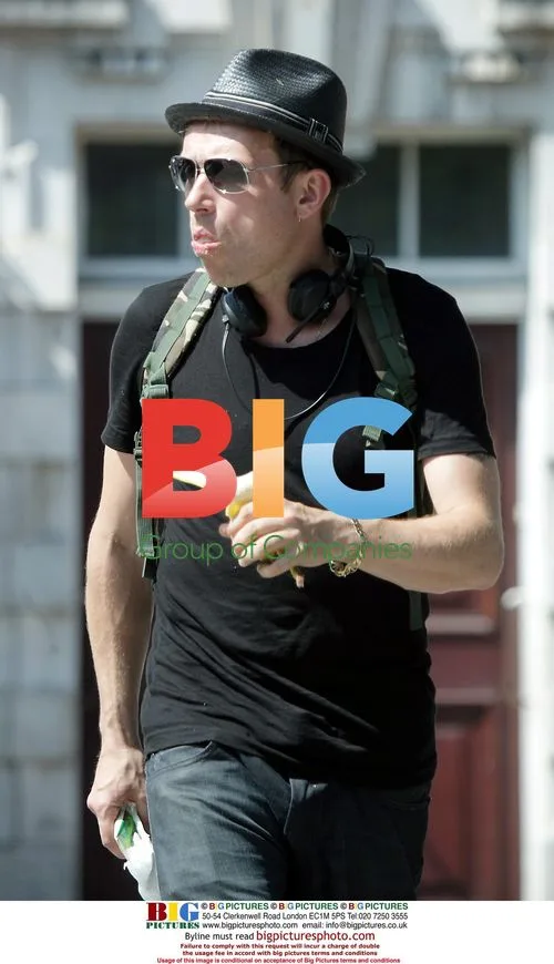 Damon Albarn eating banana in London