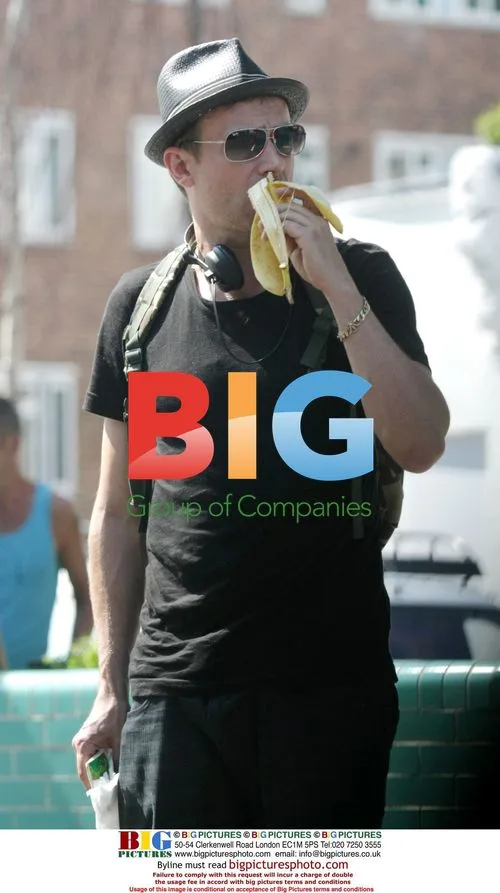 Damon Albarn eating banana in Notting Hill