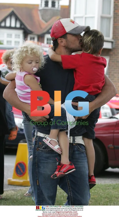 Peter Andre with kids at fair in Cowfold
